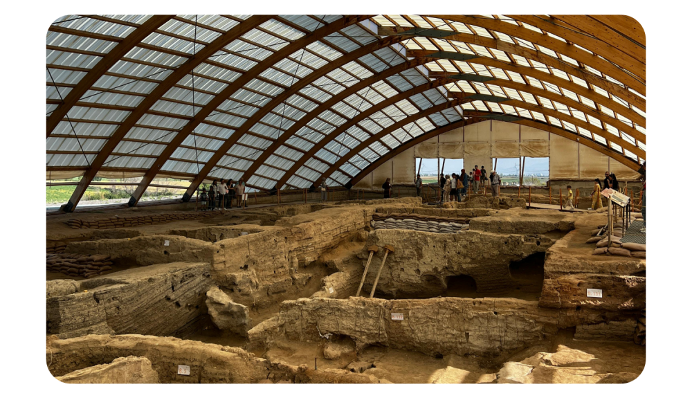 Archaeologists working on an excavation site, carefully digging and recording finds to represent fieldwork on archaeological projects.